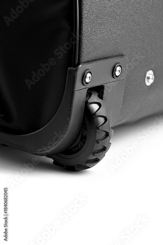 Wheeled and rolling backpack wheel close-up   