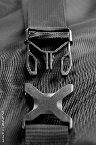 Black plastic bag push clips isolated on white background    