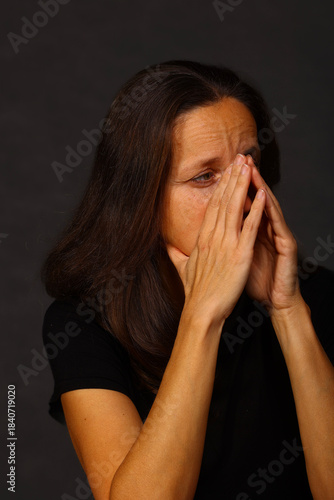 Wallpaper Mural Anxious woman covering her face, feeling fear, despair and emotional pain Torontodigital.ca
