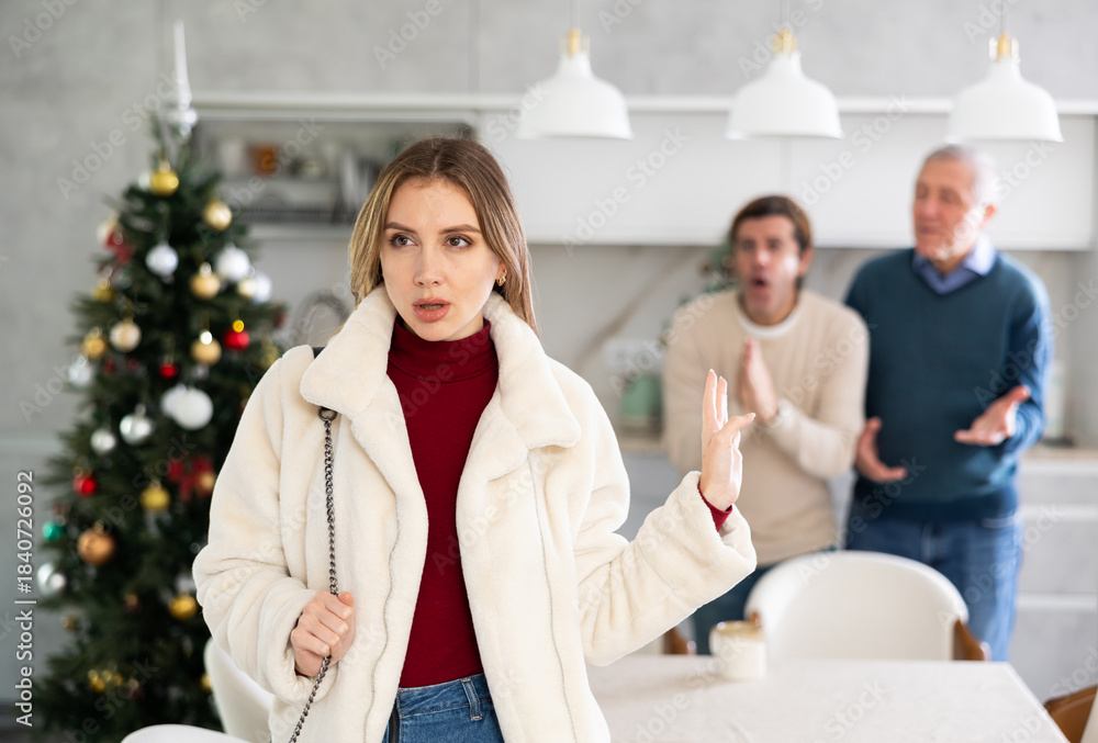 Obraz premium Men quarreling and arguing with girl, annoyed and emotional