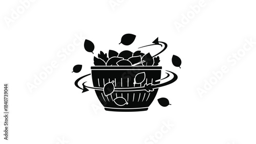 Black and white illustration of autumn leaves in a basket with swirling foliage, symbolizing seasonal change and nature