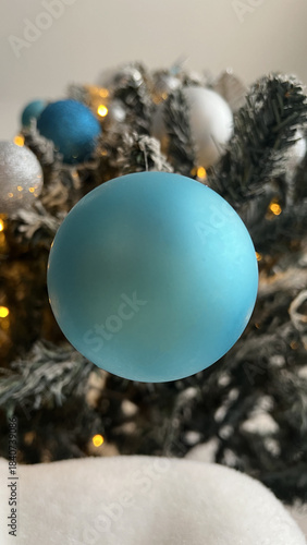 Blue Christmas Ornament ball on Tree Branch