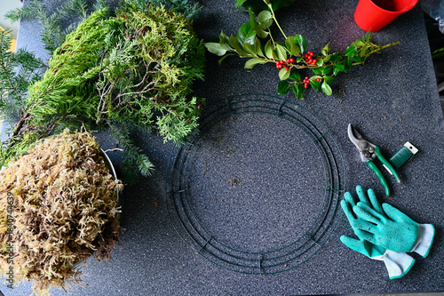 Christmas holiday winter decor, wreath making supplies and outdoor planter displays using natural plants and other organic materials