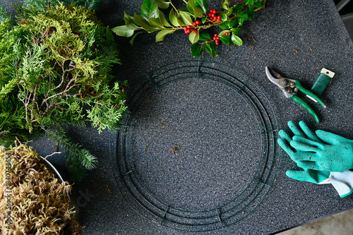 Christmas holiday winter decor, wreath making supplies and outdoor planter displays using natural plants and other organic materials