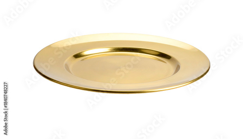 Gleaming golden charger plate isolated on a black background, perfect for a tablescape