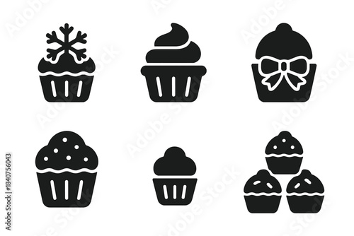 Holiday Treat Icons. Holiday treats. Filled icon set of holiday treats: cupcake with snowflake, frosted