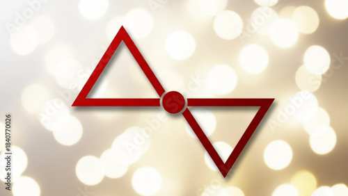 Abstract red geometric shape resembling a bow tie or butterfly with a central circle and triangles isolated on white background