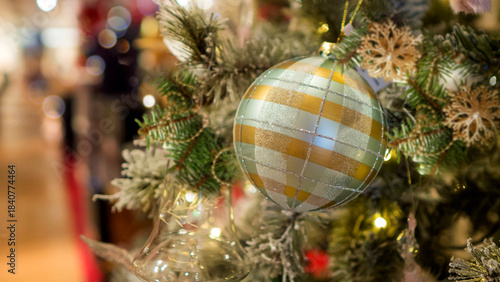 Wallpaper Mural Bright and shiny Christmas toys are hanging on the Christmas tree. Torontodigital.ca