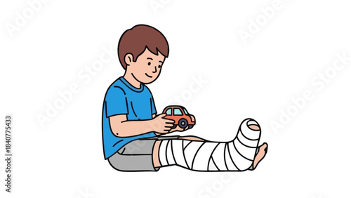 Young boy sitting with medical cast while playing with toy car  