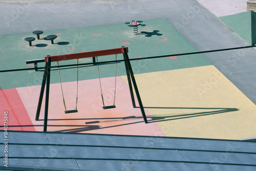 Wallpaper Mural Empty Colorful Playground with Swings and Pastel Rubber Flooring High Angle Urban Scene Torontodigital.ca