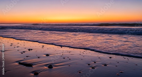 the sun is setting over the ocean