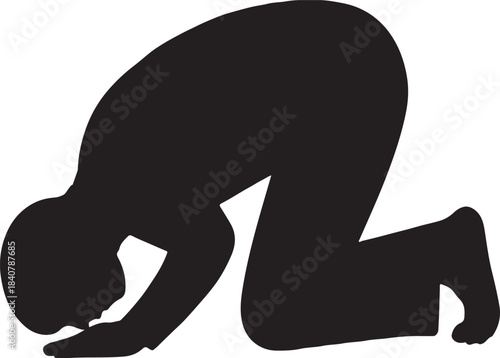 Silhouette of a man praying in prostration sujud