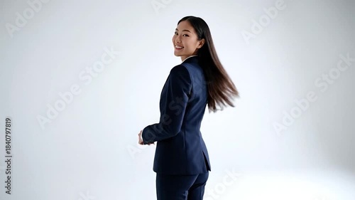 Wallpaper Mural Confident Asian Businesswoman Walking and Smiling in Professional Attire. Torontodigital.ca
