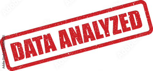 Textured red rubber stamp displaying the words DATA ANALYZED indicating completion of a thorough review process