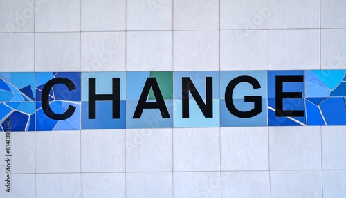 CHANGE word tile decor on wall.