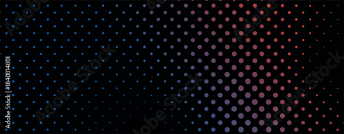 Blue to red gradient dots on black background abstract