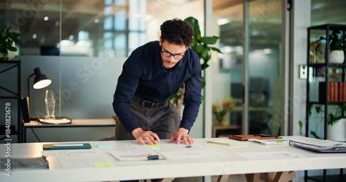 Planning, business man and writing in notebook for article reminder, schedule and deadline update. Journalist, person or paperwork with sticky notes at creative agency for story planner or organizing