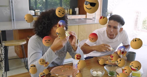 Two men arranging ingredients, making and eating avocado toast, sharing meal as emojis multiplying