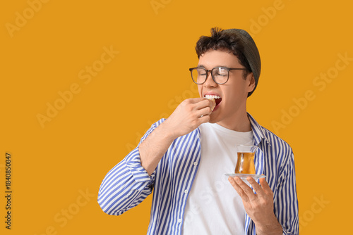 Young man with Turkish tea ...