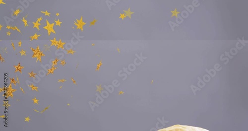 Gold confetti appearing upper-left, drifting across frame, revealing burger and fries, adding flair