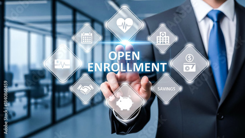 A businessmans hand interacts with a glowing virtual display showing OPEN ENROLLMENT at its center. Surrounding icons represent health, calendar, hospital, savings, and finance, symbolizing the