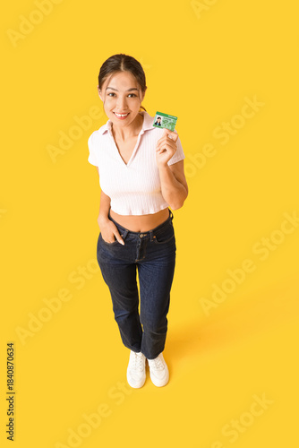 Young Asian woman with driv...