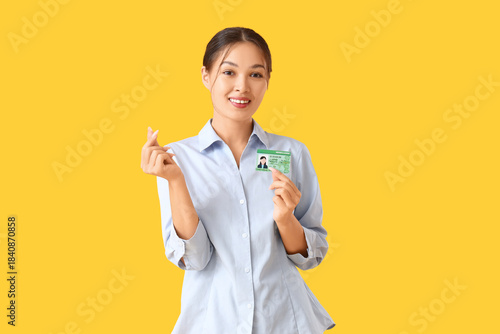 Young Asian woman with driv...
