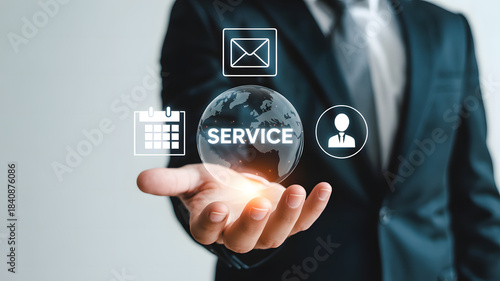 Business Hand Holding Digital Globe with SERVICE Email Calendar and User Icons for Customer Support