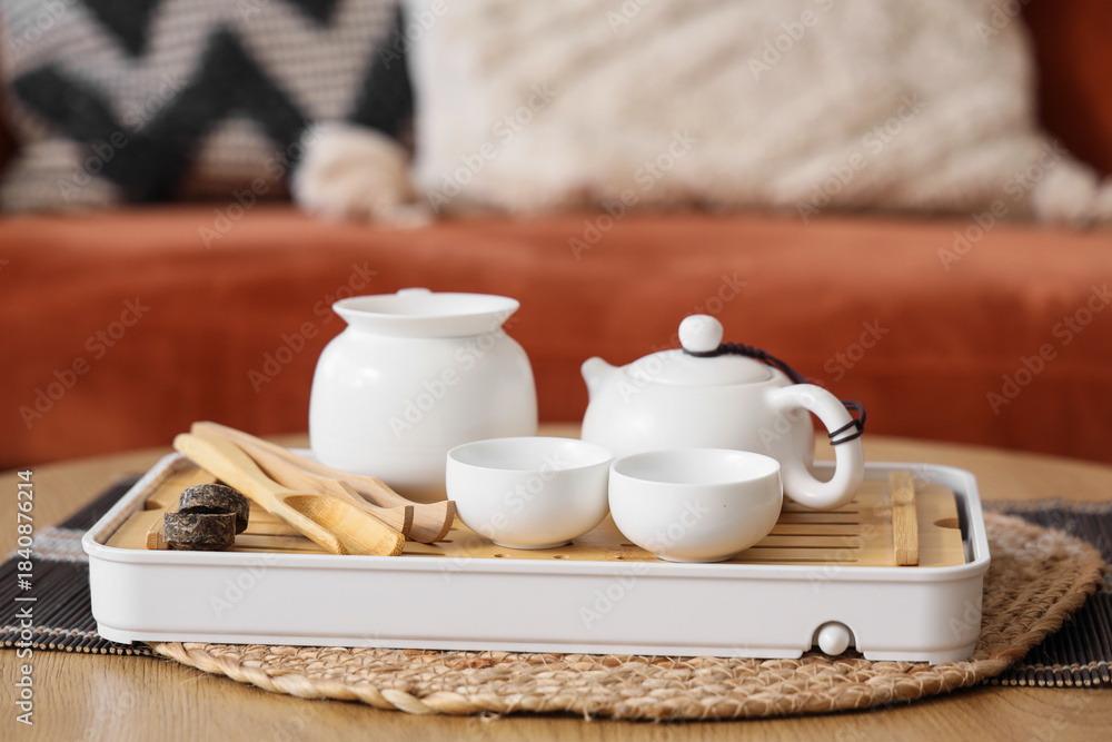 Fototapeta premium Asian tea set on table in living room, closeup