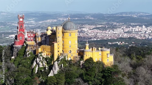 Drone circle around The Pena National Palace in Pena Park above the town of Sintra