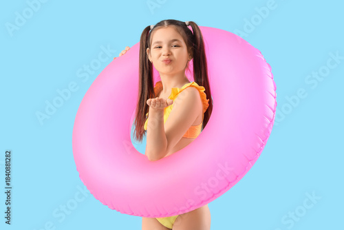 Cute girl with pink swim ri...