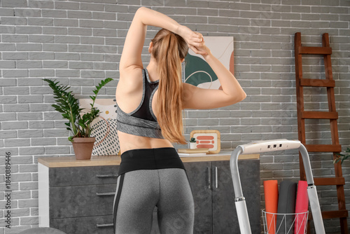Sporty woman training near ...