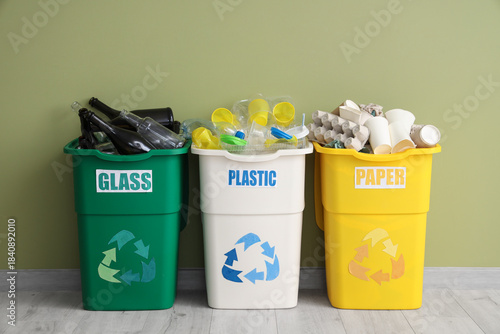 Full trash bins with differ...