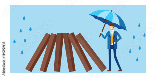 Businessman shielding from rain near falling dominoes representing risk and protection