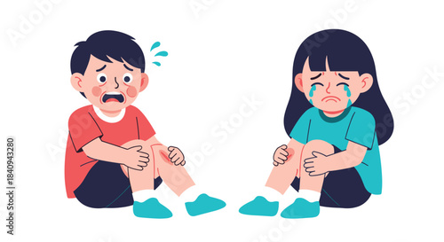 Two young children, a boy and a girl, sitting on the ground and looking distressed with scraped knees, showing pain and sadness.