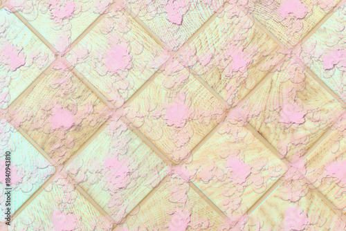 Checkered wooden warm tiles surface with pink spotted