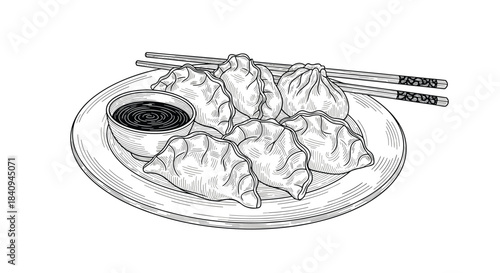Plate of dumplings with a small bowl of dipping sauce and chopsticks arranged on a round plate for a traditional Asian meal.