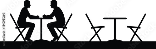 Silhouette of two people sitting at café table talking together, representing communication, conversation, relationship interaction, outdoor meeting scene in minimal setting