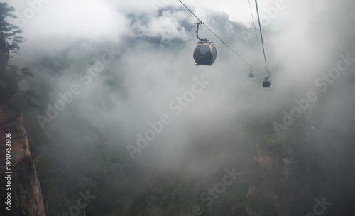 Tianzi Mountain cable car in dense fog 