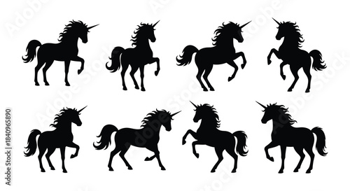 Collection of black silhouette unicorn illustrations in various rearing poses