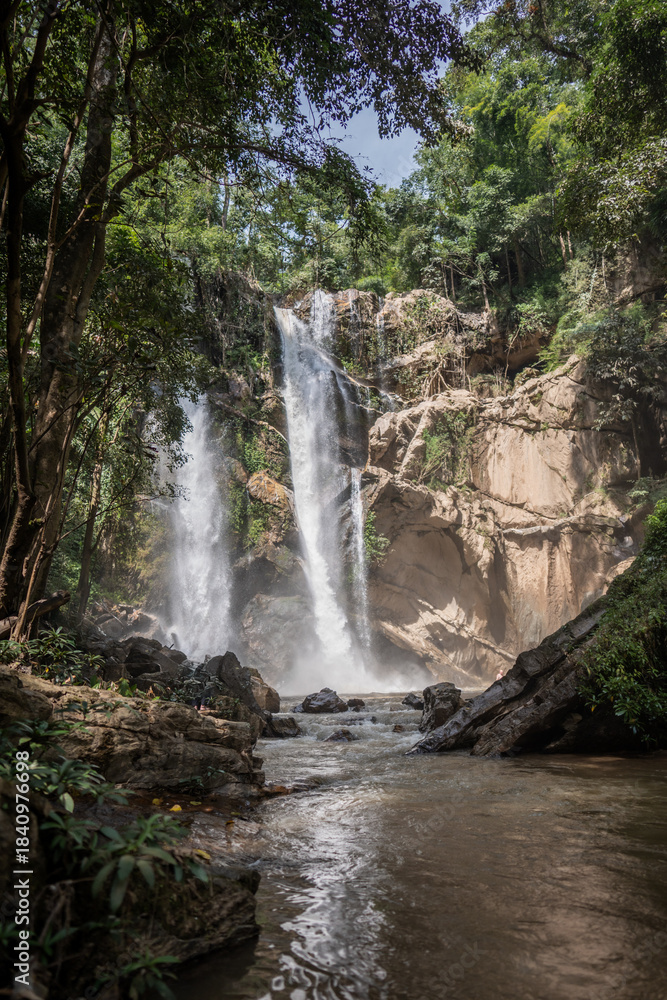 Obraz premium Mok Fa Waterfall, a stream of forest in Chiang Mai, Thailand.