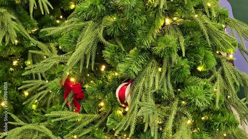  Christmas tree is adorned with twinkling lights
