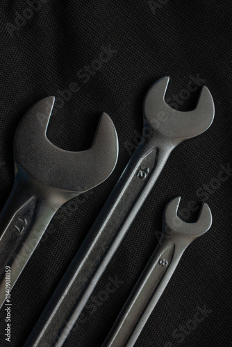 wrenches on black