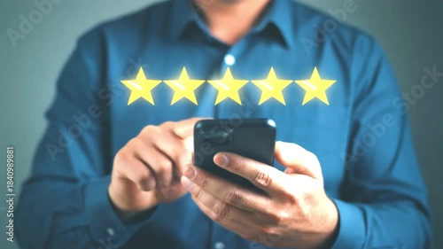 A customer rates their experience on their smartphone and awards 5 stars as a symbol of excellent service.