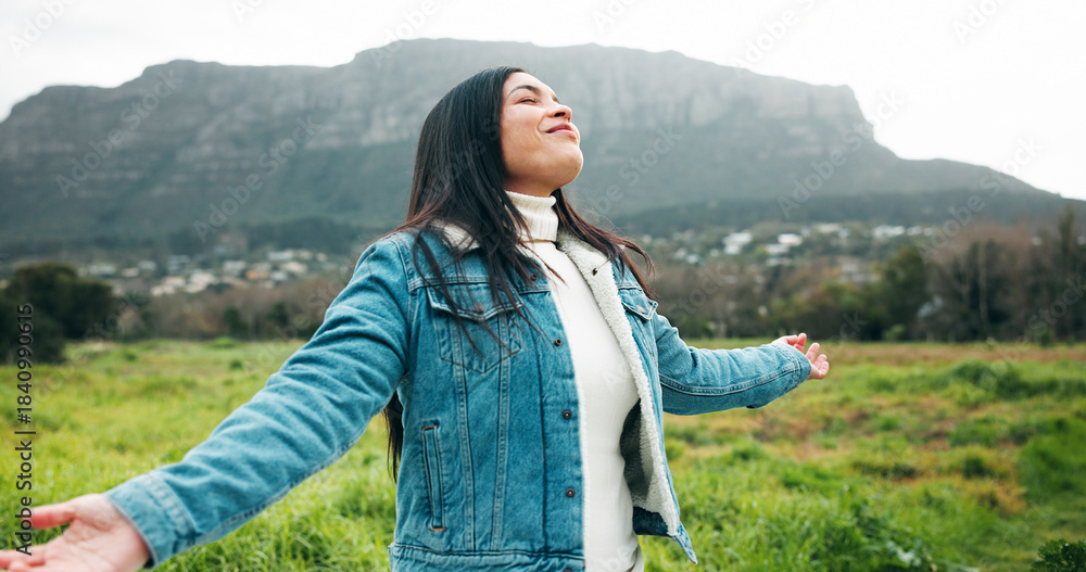 Naklejka premium Peaceful holiday, woman and freedom in field with mindfulness, travel gratitude and fresh air. Winter getaway, happy person and calm in countryside with weekend adventure, breathing and relax on trip