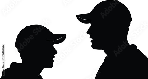 Vector Silhouette Close-up of Two Male Profiles Wearing Baseball Caps: Side View Conversation Representing Mentorship, Father-Son Bond, or Casual Discussion