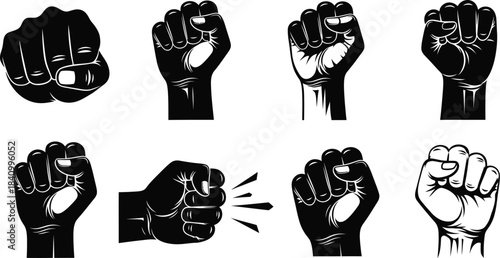 Collection of raised fists in various black and white graphic styles