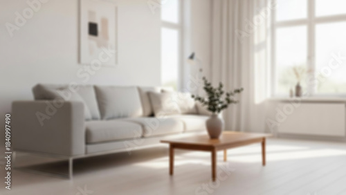 Blurred Bright modern living room featuring a comfortable sofa, wooden coffee table, and minimalist decor, illuminated by natural light, creating a serene and inviting contemporary home