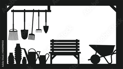 Black and white of gardening tools and a bench in a shed shovel rake