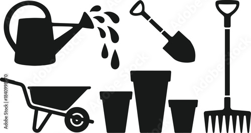 Black and white gardening tools and equipment with water droplets